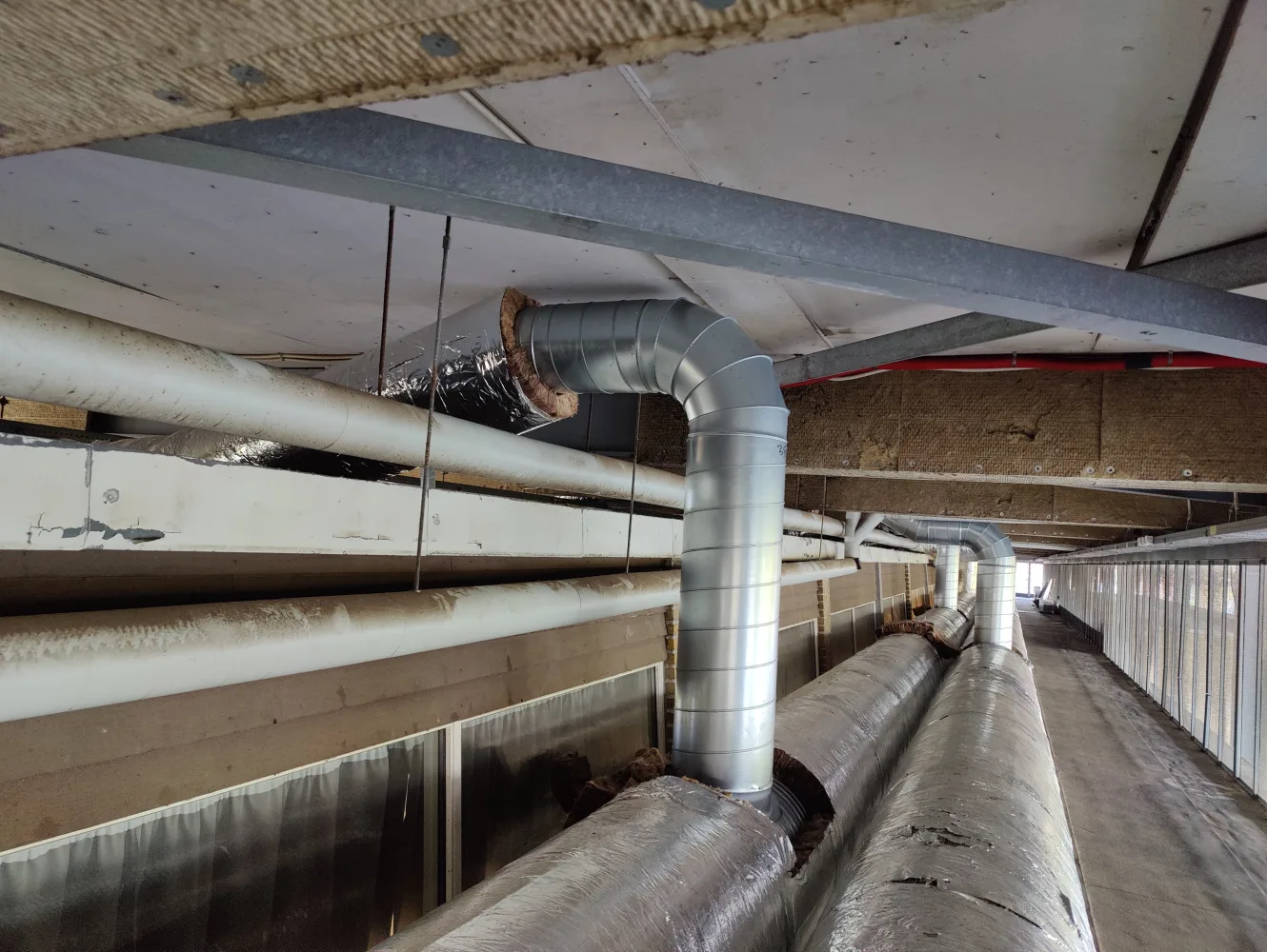 Ventilationskanaler under bygning på Pilegårdsskolen med adgangsforhold og føringsveje